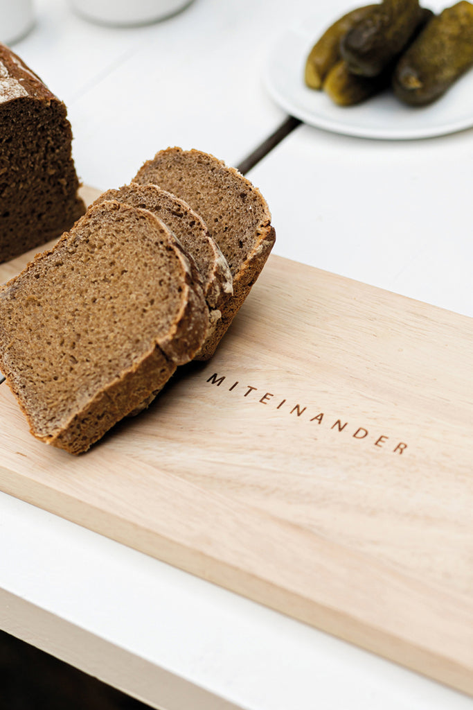 Schneidebrett Puzzleteil räder design