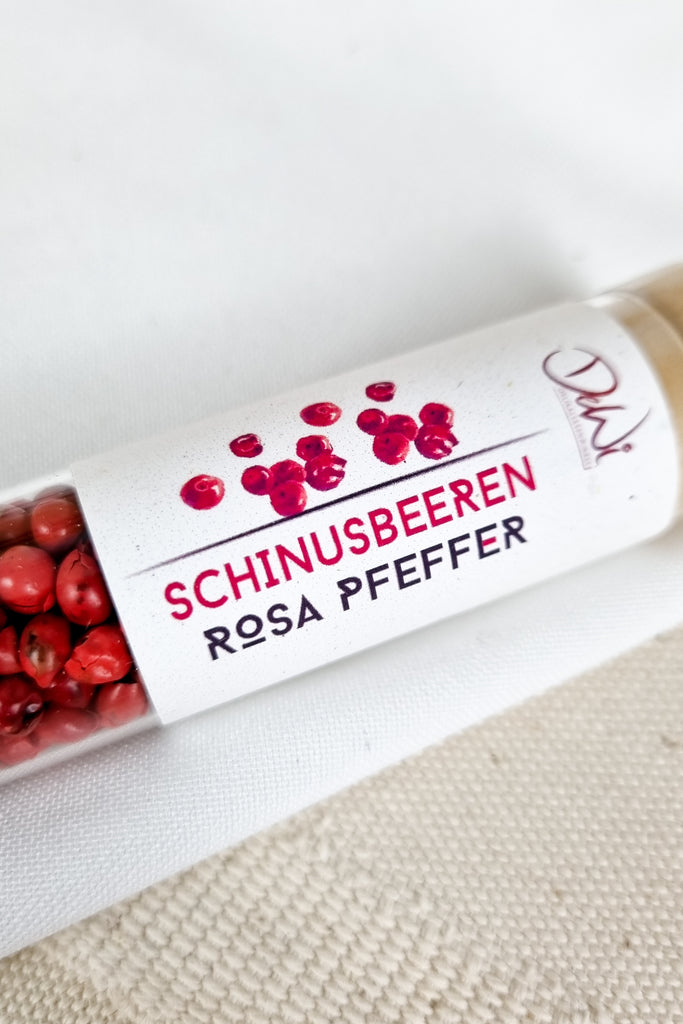 gewürze im reagenzglas Rosa-Pfeffer-Schinusbeeren